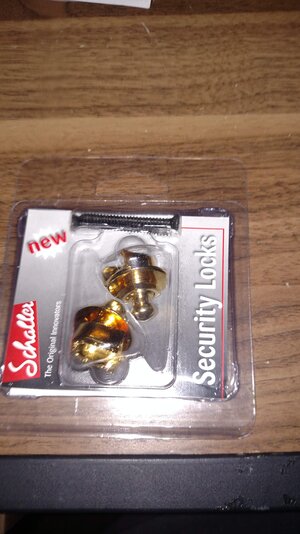 Schaller gold strap locks