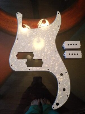 White Pearloid Precision Pickguard plus white pickup covers