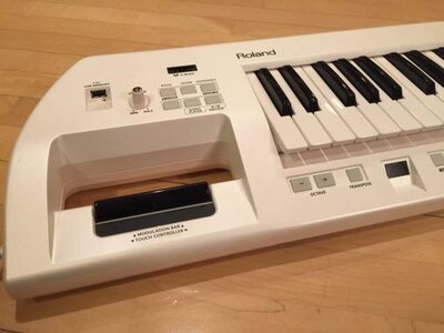 Really cool Roland Lucina Synthesizer - Play as a keytar on shoulder strap or the old fashioned  way