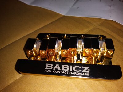 Babicz 4 string gold