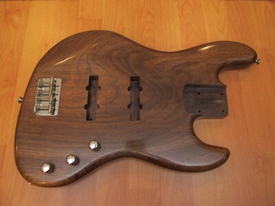 Walnut body, one piece, nitro finish semi loaded or naked