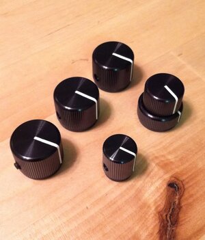 Sold: New set of 5 Black aluminum knobs..