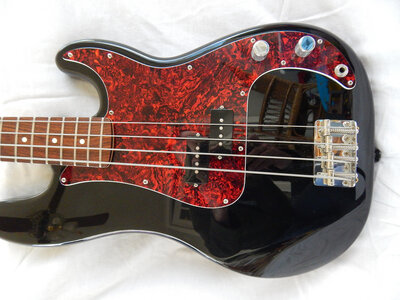 2002 Fender Standard (MIM) black P-bass with red tort pick guard