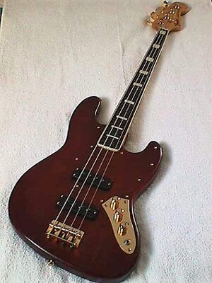 Fretless jazz bass. Block/bound neck. Gold hardware. Unique