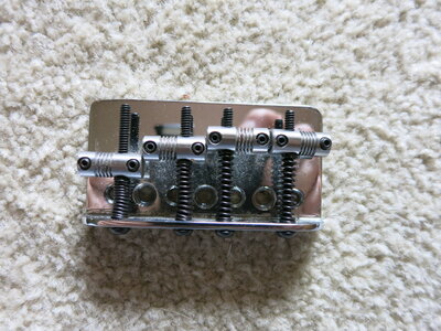 American Fender 4 string bass bridge. ( string through)