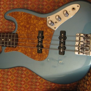 Gold Dragonfire Pearloid on Lake Placid Blue Jazz MIM