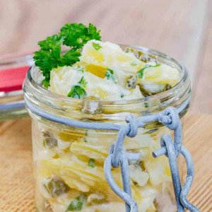 Potato salad in a jar on wooden