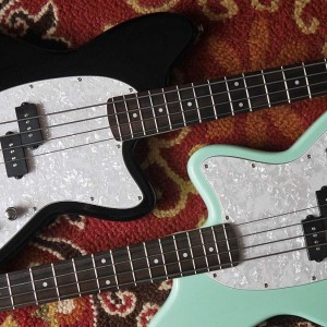 A pair of TMB100s with pearl pickguards